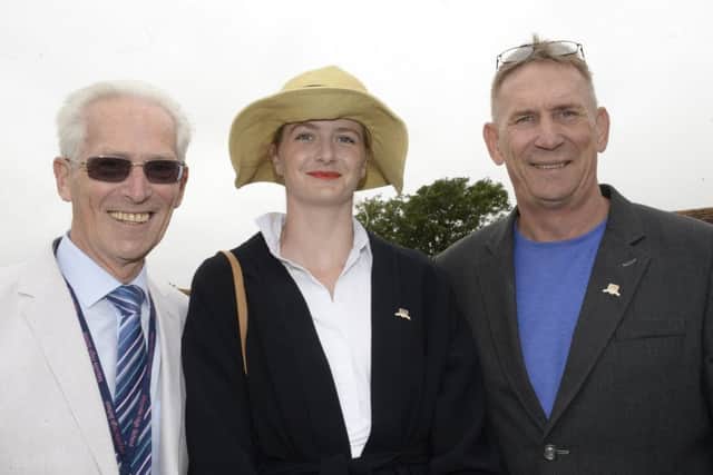 Michael Babcock, chair of the trustees, with past pupil Ellidh McIntyre, who is on the GB sailing team, with Alan Knight from Portsmouth Football Club. Picture by Nick Scott Photography.