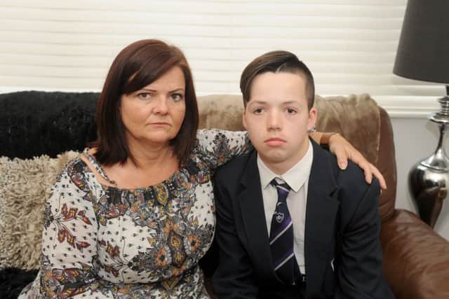 Aaron Prior, 15, and his mum Sam Picture: Sarah Standing (170834-4170)
