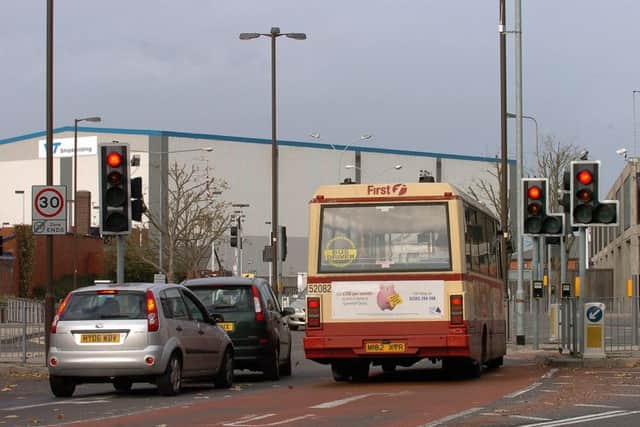 064968_0115_UNICORN_ROAD_LIGHTS (CO) 21/11/06
The traffic lights junction at Unicorn Road, Landport, Portsmouth, looking north towards Unicorn Gate, at the juction with Alfred Road and Market Way. The lights give a long wait at red, then only 15-seconds at green. Vehicles and motorists often have to wait two changes, causing anger and delays for drivers.
PICTURE: MICHAEL SCADDAN (064968-0115) MAYOAK0003370765