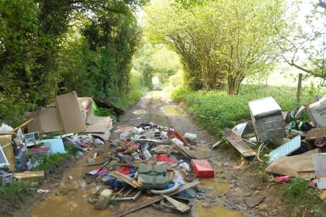An example of fly-tipping, where rubbish was left strewn across Dean Lane, at Bishop's Waltham