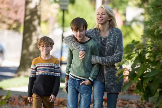 Jacob Tremblay as Peter Carpenter, Jaeden Lieberher as Henry Carpenter and Naomi Watts as Susan Carpenter in The Book Of Henr.
