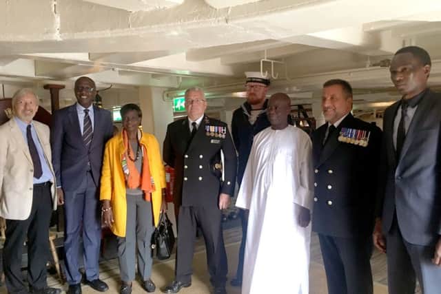 Centre, the ambassador of Senegal Cheikh Ahmadou Dieng with WO1 Dickie Henderson, executive officer of HMS Victory 
Picture: Tamara Siddiqui