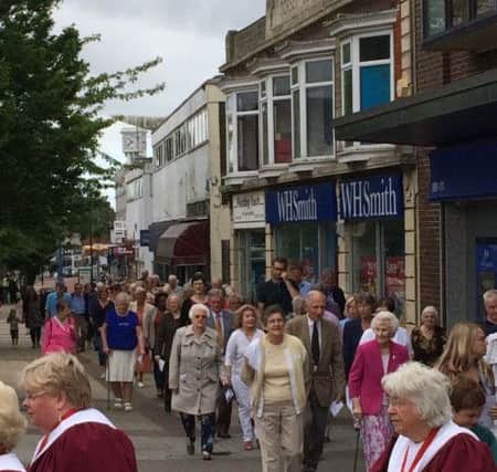 A procession by St Georges congregation to mark the retirement of Fr Mike Sheffield