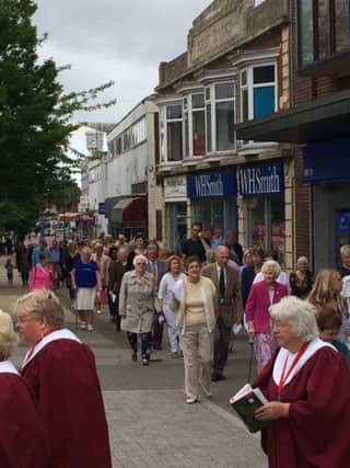 A procession by St Georges congregation to mark the retirement of Fr Mike Sheffield