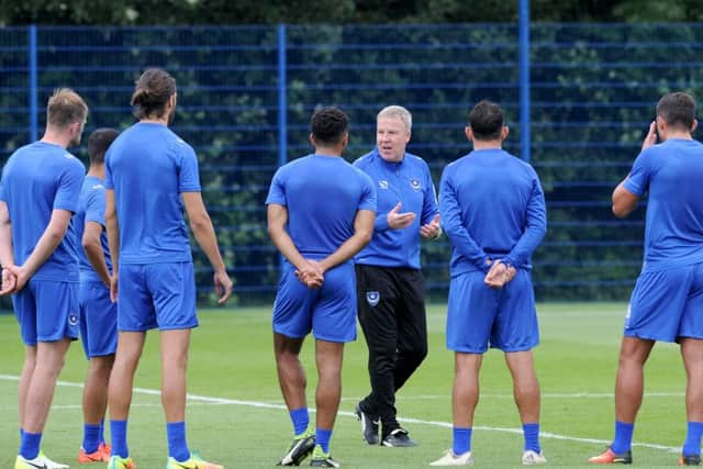 Kenny Jackett briefs his new Pompey players. Picture: Sarah Standing