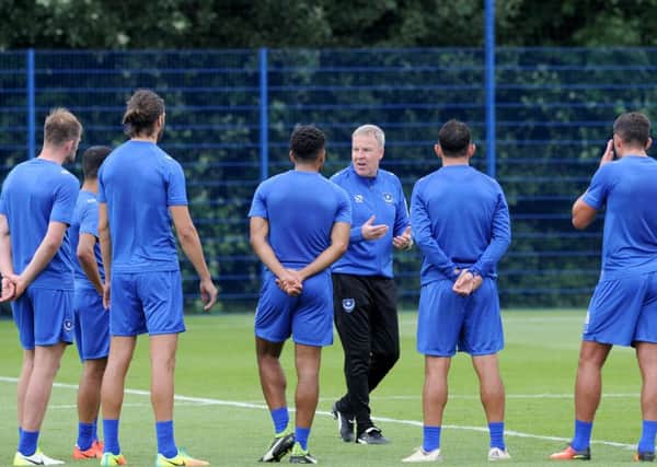 Kenny Jackett briefs his new Pompey players. Picture: Sarah Standing