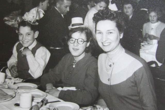 Gladys with children at the Police Christmas Party circa 1952