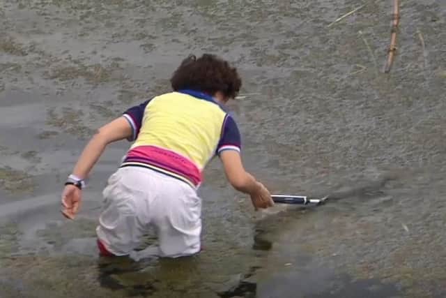 The putter is retrieved