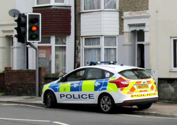 Police at St Mary's Road, Fratton, near the corner of Shakespeare Road. 
Picture: Deborah Croker
