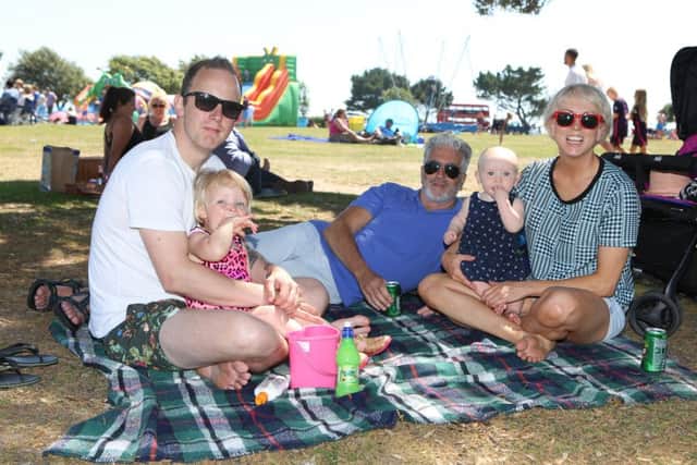 Andy Dickson with Lola, two, Michael Kays, Lily 11 months and Michelle Kays, enjoying the Big Lunch at Canoe Lake, Southsea. 
PPhoto by Habibur Rahman (170618)