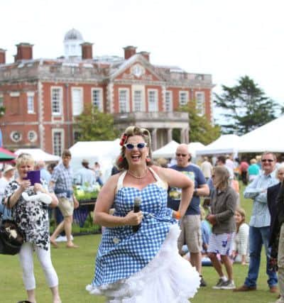 Singer Dawn Gracie getting into the swing of things at Stansted Garden Show, Rowlands Castle. Picture by Habibur Rahman (171206)