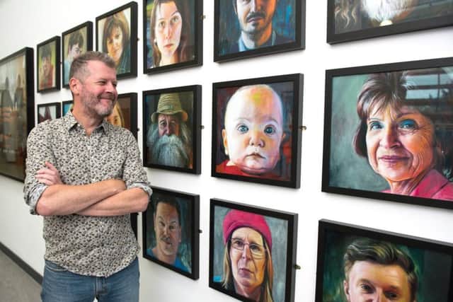 Karl Rudziak with some of his paintings at the We Don't Need Culture exhibition at the Somers Town Community Hub.
Picture: Vernon Nash