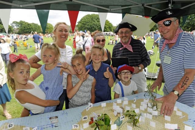 The Bedhampton Summer Show. Organisers Mike Sellis (left), and Ron Tate with Claire Hallawell (left), and family.Picture Ian Hargreaves  (170748-1)