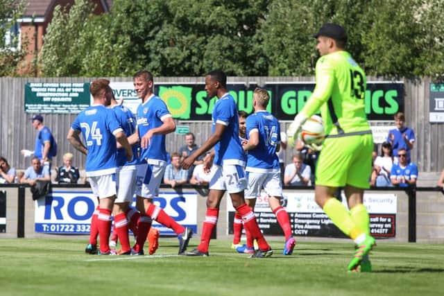 Pompey celebrate Tom Davies' goal at Salisbury. Picture: Habibur Rahman (170816-936)