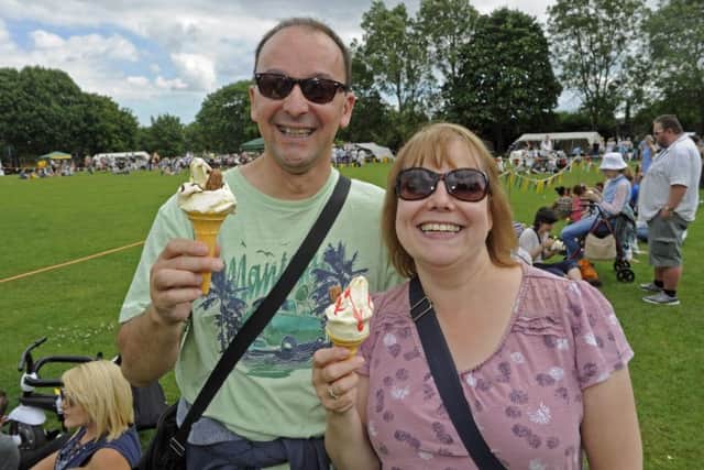 Residents David Houston and Karen Jackson enjoy an ice cream
(170748-1)