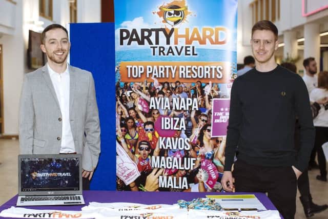 Award winning co-founders Barry Moore, left,  and Nathan Cable promote their travel company