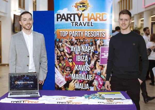Award winning co-founders Barry Moore, left,  and Nathan Cable promote their travel company