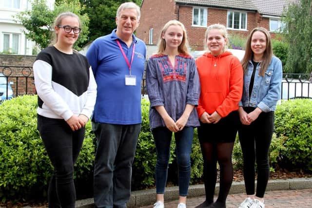 From left: Deputy Head Girl Annie Caddle (17)  Andrew Lane, Leader of the local group of volunteers for Motor Neurone Disease Association, Head Girl Nancy Fenton (16), Deputy Head Girls Amy Sparkes, and Alice Lovegrove, both 17    Picture: Sally Tiller