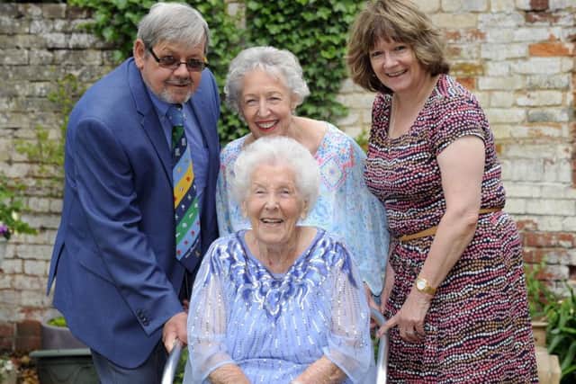 The birthday girl with, left to right, her nephew Terry Halliday, daughter Maureen Colatorti, and niece Tina Kirkpatrick. Picture: Malcolm Wells (170716)