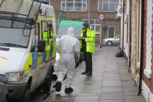 Forensics officers investigate after the death in Toronto Road in January
