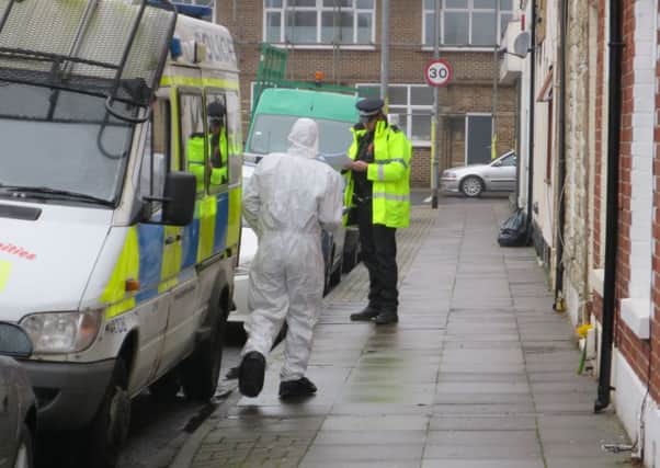 Forensics officers investigate after the death in Toronto Road in January