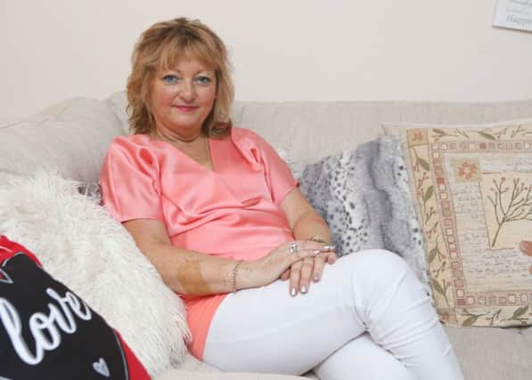 Aileen Sullivan Hopkins relaxing at home after a difficult two years in which her marriage broke down and she was diagnosed with cancer. Picture by
Habibur Rahman (170621).