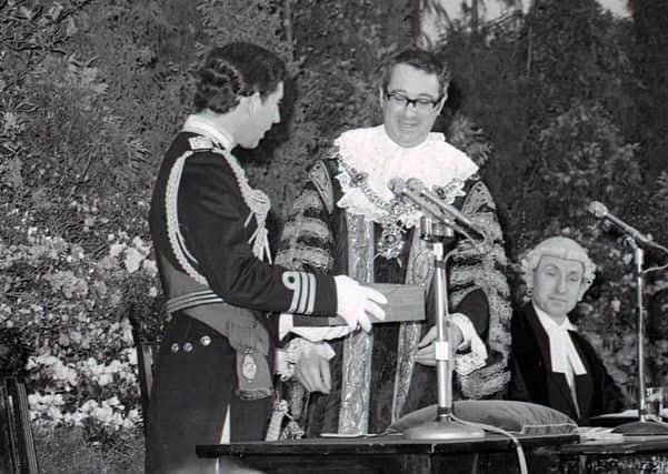 The Lord Mayor of Portsmouth Mr Richard Sotnick hands the Freedom Scroll to HRH Prince Charles in the Guildhall
 on  February 23, 1979