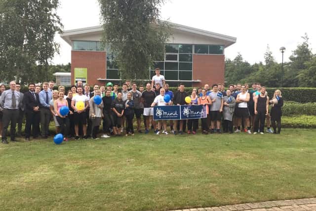 The Whiteley Onecom team celebrates raising Â£2,000