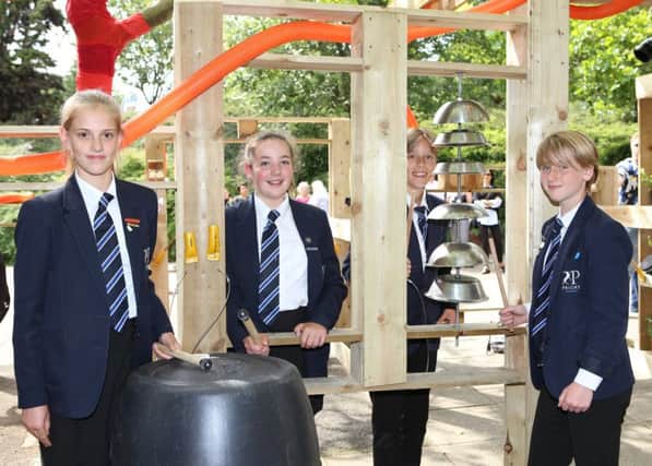 Priory School pupils Scarlet Jones, 12, Hermione Troke, 12, Tylor Gaffney 13 and Hollie Eeles, also 13, at the underpass Sound Garden they helped to build. 
Picture by Habibur Rahman (170630).