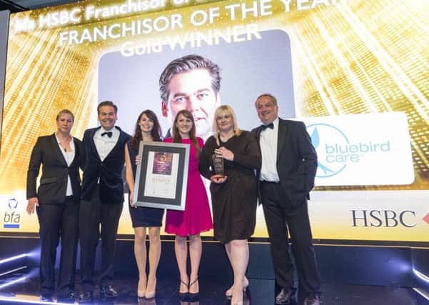 The Bluebird Care team accept the gold award for Franchisor of The Year Picture: rogerharrisphotography.co.uk