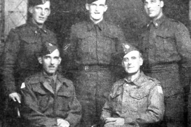 The Gisborne family of 30, Wimborne Road, Southsea, a father, bottom right, and four sons who all did their bit in the Second World War.