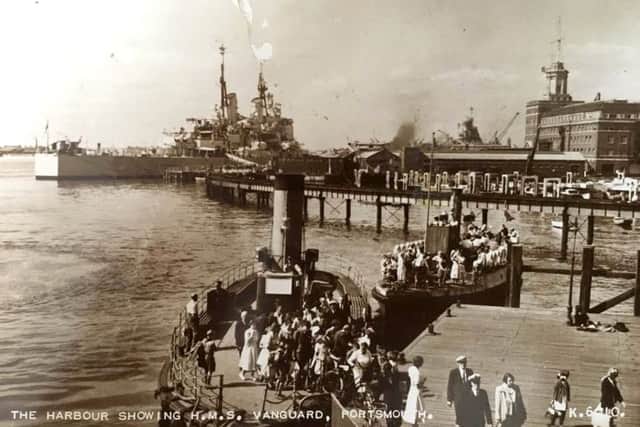 HMS Vanguard, with her innovative flat stern,  tied up at South Railway Jetty in the dockyard on a summers day. Unfortunately theres no date on this postcard, but the clothes suggest the 1950s.