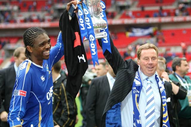 Kanu and Harry Redknapp celebrate Pompey's 2008 FA Cup triumph
