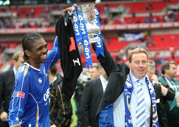 Kanu and Harry Redknapp celebrate Pompey's 2008 FA Cup triumph