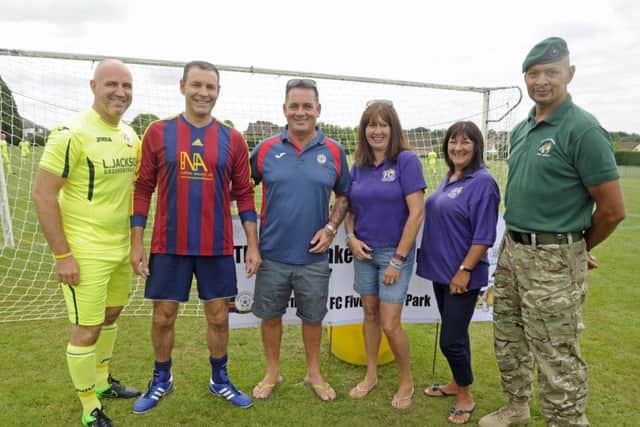 From left, Mark Stockley, Alan Hankey and Lea Jackson, with Pam Marshall and Sue Stokes of Hannah's Holiday Homes and former Royal Marine Chris Falcke.
Picture Ian Hargreaves