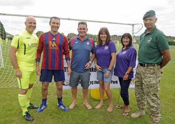 From left, Mark Stockley, Alan Hankey and Lea Jackson, with Pam Marshall and Sue Stokes of Hannah's Holiday Homes and former Royal Marine Chris Falcke. 
Picture Ian Hargreaves