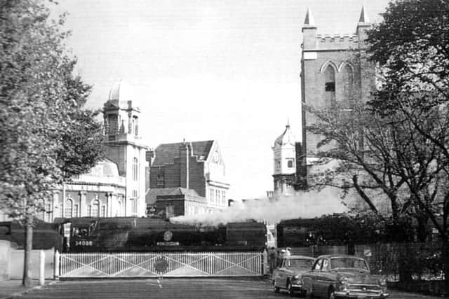 Thought to be impossible because of  the tight curves, a Bullied Light Pacific crosses Edinburgh Road, Portsmouth, on the dockyard branch on November 3, 1963. It was on a special tour taking in this old branch line.