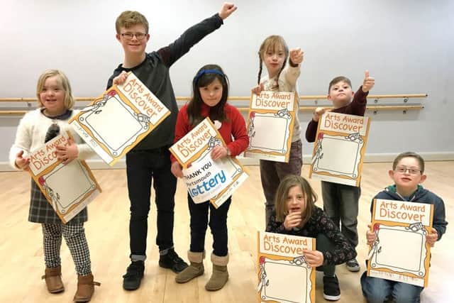 From left, Rose Waddington, 10, Max Ross, 12, Matilda Field, 10, Lucy Burfoot, 10, Isaac Nightingale, 10, with Megan Hartridge, 12, and Ethan Phillips, 10, kneeling