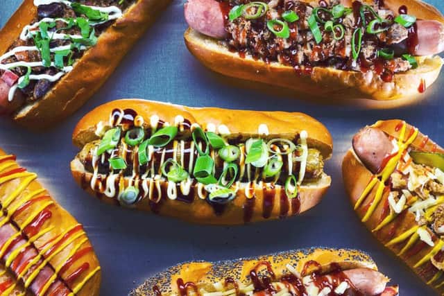 A selection of Feed's hot dogs 
with a Veggie Tokyo Dog taking centre stage
