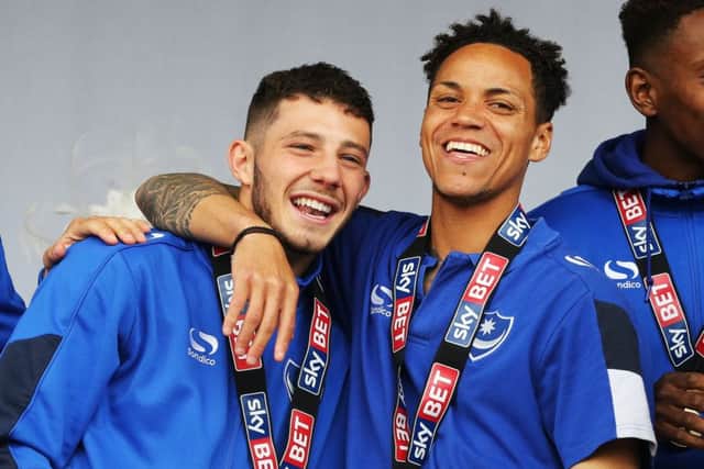 Conor Chaplin, left, celebrates Pompey League Two title win with Kyle Bennett