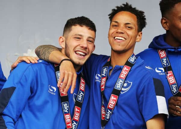 Conor Chaplin, left, celebrates Pompey League Two title win with Kyle Bennett