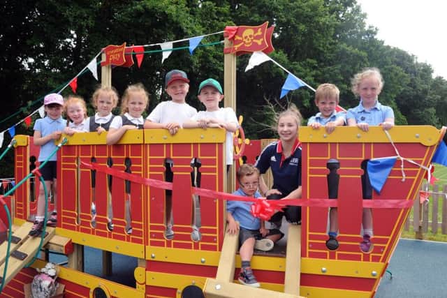 Gymnast Kelly Simm with pupils, from left, Lilly Enfield, Mia Osborne, Emilie Nelson, Grace Nelson, Charlie Felton, Blake Nelson, Austen Bainbridge, Seb Wilkinson and Zoe Kilmister.
Picture: Sarah Standing (170786-3701)