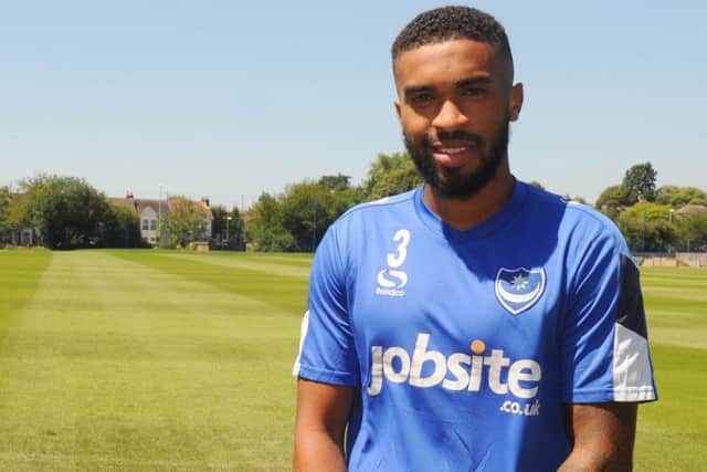Left-back Tareiq Holmes-Dennis is Pompeys second signing of the summer