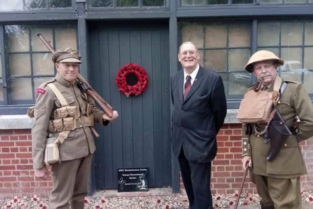 Charles Hasker and military re-enactors at the centre's opening