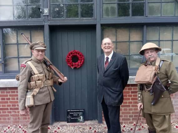 Charles Hasker and military re-enactors at the centre's opening