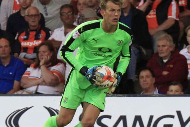 Brighton keeper Christian Walton has held talks with Pompey