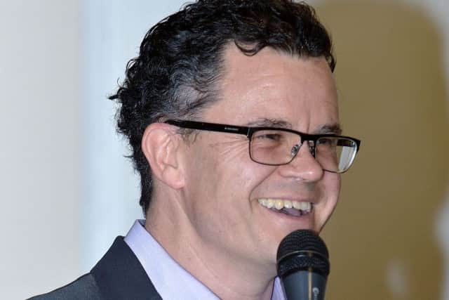 Dominic Holland
