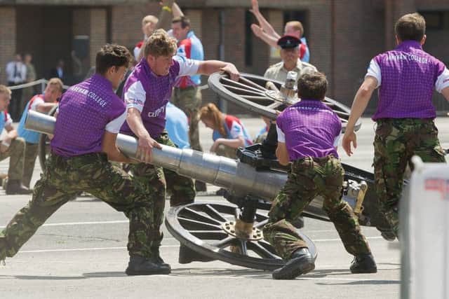 Fareham College tip their gun over in the first race of the competition Pictures:: Keith Woodland
