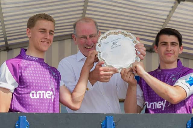 Fareham College receiving their trophy