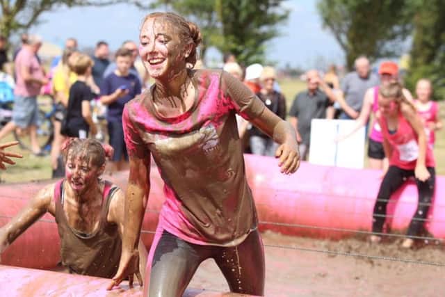 Families took part in the Pretty Muddy 5K in Southsea on July 8. Picture: Habibur Rahman